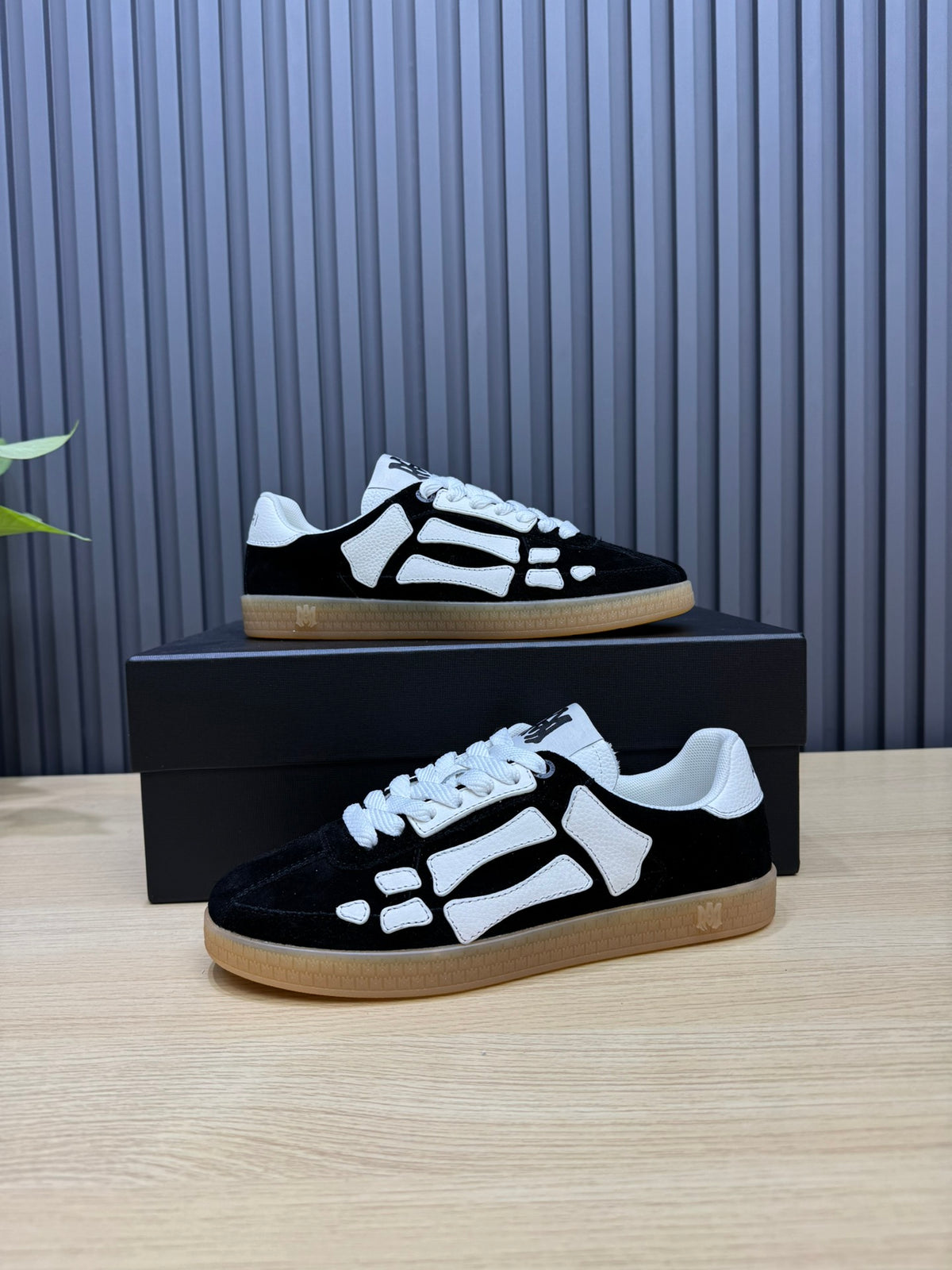 AMIRI Black & White Bone-Detail Gum-Sole Sneakers