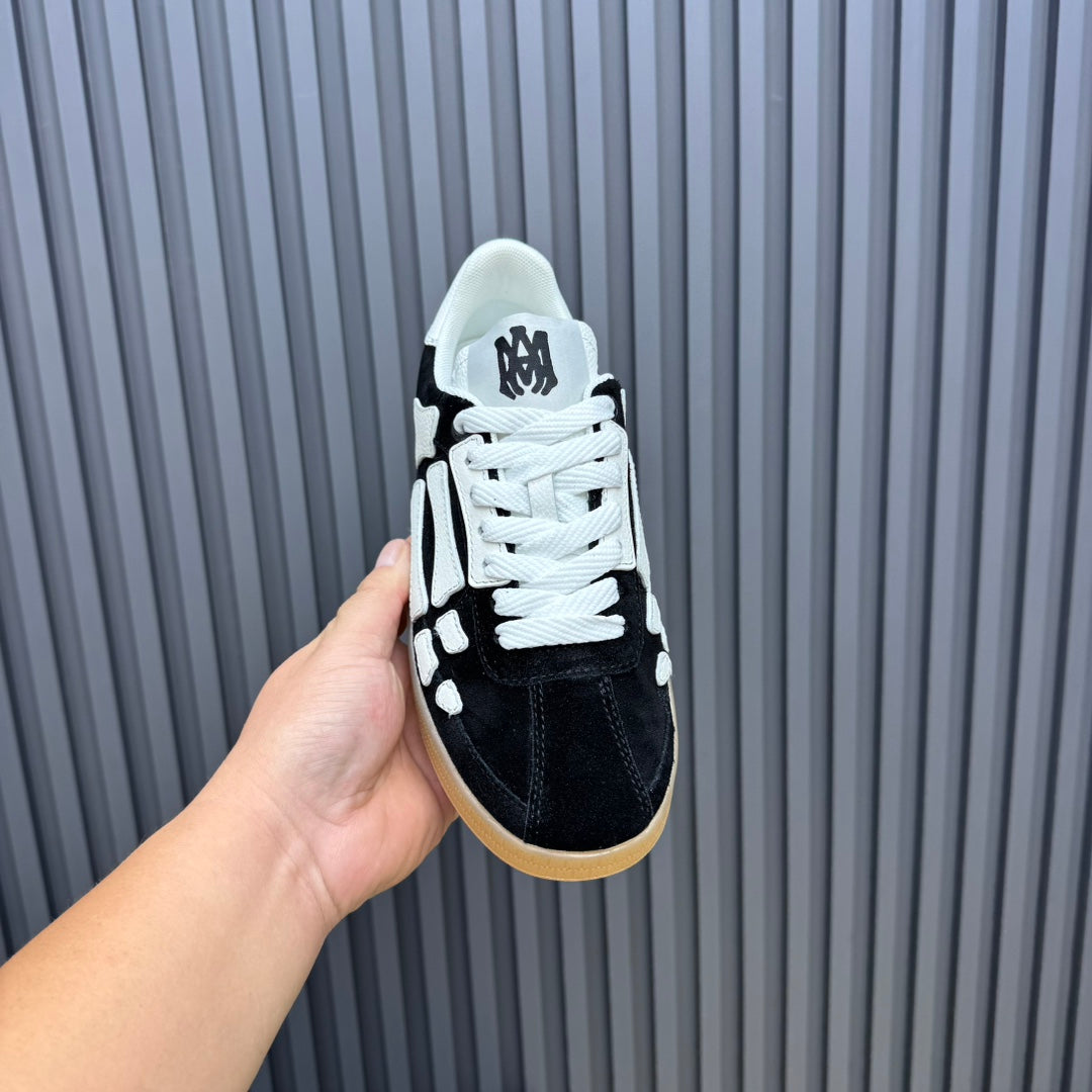 AMIRI Black & White Bone-Detail Gum-Sole Sneakers